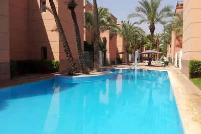 Image de A 5min à pied de la Médina, Riad dans résidence sécurisée (gardes) avec piscines