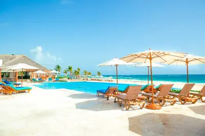 Image de Condo de plage de luxe avec voiturette de golf Gratuite<br>Et service de ménage @ Hard Rock Punta Cana