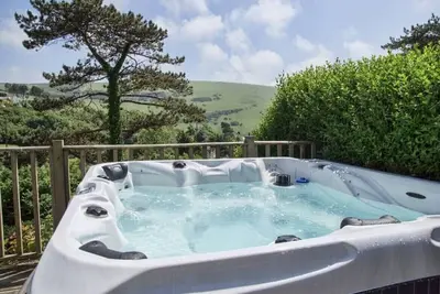 Image de Incroyable vue sur la mer à proximité de la plage de Woolacombe. Grand jardin avec bain à remous.