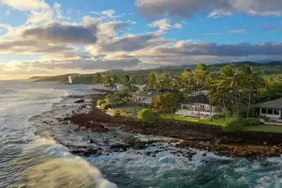 Image de Kukui'ula Kai - Maison en bord de mer avec piscine et grand salon