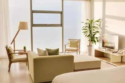 Image de Suite de luxe face à la plage et vue sur la mer avec piscine