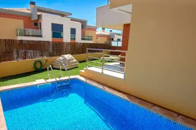 Image de 4 chambres, villa de vacances avec piscine, golf à proximité à Albufeira