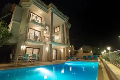 Image de Superbe villa de 3 étages avec une vue magnifique sur la baie de Kalkan. Piscine chauffée.