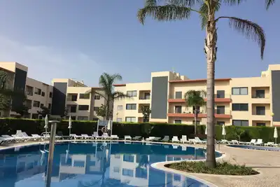Image de 3min de la marina, Appartement avec A/C, terrasse, résidence avec piscine, Wifi