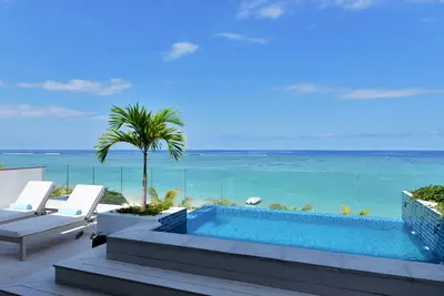 Image de Open Sky Penthouse | Pieds dans l'eau sur la plage de Wolmar | Ménage et cuisine