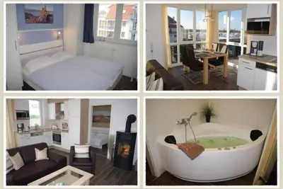 Image de Vue sur la mer depuis le balcon | Sauna | Whirlpool | Wlan | cheminée