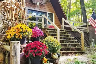 Image de Cadre extérieur reculé sur la superficie du lac Hamlin-bain à remous-kayaks-foyer