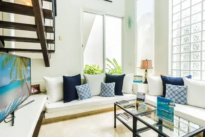 Image de Condo 2 chambres avec salon sur 2 niveaux de Bric au Royal Palms