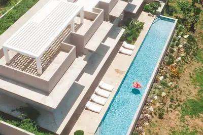 Image de Superbe Villa Eco-luxe sur la mer des CaraĂŻbes avec piscine de 94 pieds, pour 16 personnes