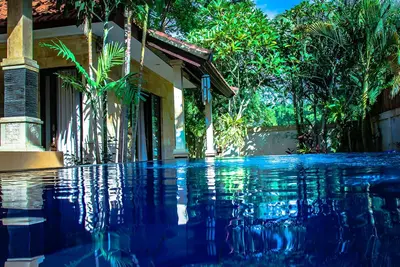 Image de Villa Impian une villa de luxe dans un quartier calme de Canggu, à quelques minutes de la plage.