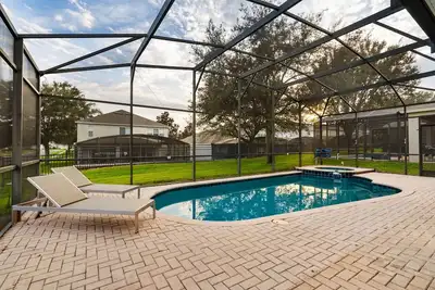 Image de Enchanting Retreat: A Charming 6-Bd Oasis with Themed Rooms and Pv Pool Bliss