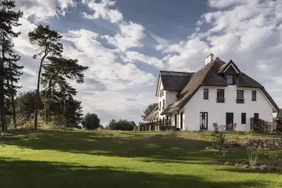 Image de Appartement de luxe avec cheminée, 2 terrasses, vue sur l'eau et par jour. Nettoyage incl.