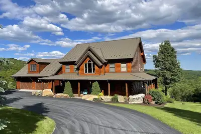 Image de Incroyable maison de bois avec des vues qui abondent! Al Meucci Immobilier