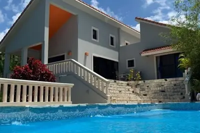 Image de Villa de luxe moderne 4br Sosua, vue sur l'océan, piscine, jacuzzi, à pied des plages, ville