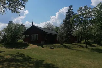 Image de Location maison dans le sud de la Suède Småland 6 personnes. + Bateau d'aviron, l'emplacement au bord du lac