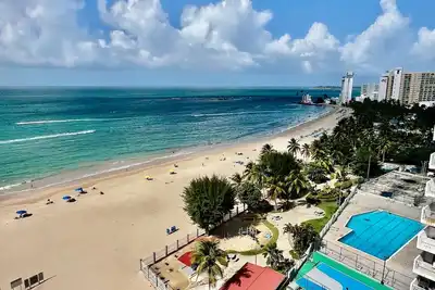 Image de Spectaculaire condo avec vue sur l'océan au cœur d'Isla Verde! # 2