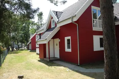Image de Nouveau, maison de plage près de m. Whirlpool, sauna infrarouge, cheminée u. Wifi