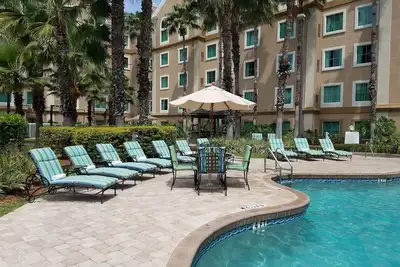 Image de Navette Disney Gratuite + Aucun frais d'hôtel | Suite spacieuse près des parcs thématiques d'Orlando