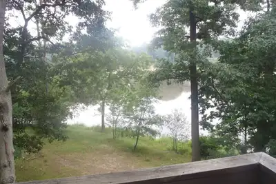 Image de Unité de bord de mer mignon sur le lac avec quai près du centre-ville de Saugatuck