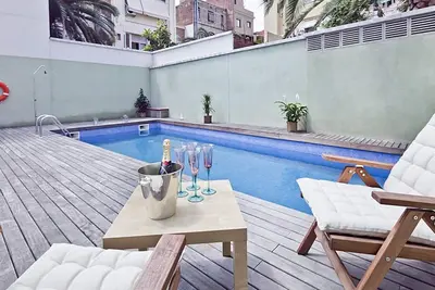 Image de Penthouse avec piscine et terrasse à Gracià 2 hab 6 pax - WiFi gratuit