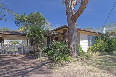 Image de 'Evan's Retreat' 5 Sandy Point Road - chalet en face de la plage de Sandy Point