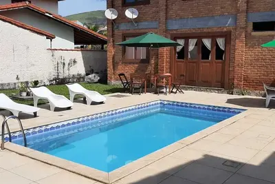Image de Piscine, Sauna, Hydro, Wifi, 4 Qt tous c / Ar, 4 salles de bain (1suite), condom c / Praia