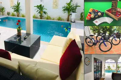 Image de Piscine privée, près de la plage et de la rue piétonne. Snooker, vélos, dartbord. . .