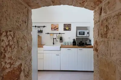 Image de Trullo Marte une oasis de paix immergée dans le vert des collines monopolistiques