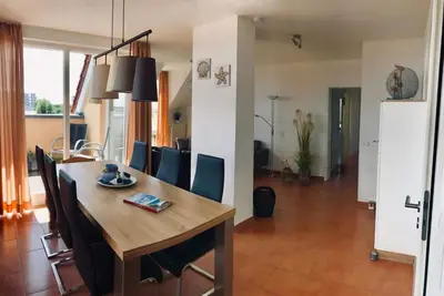 Image de Penthouse avec vue sur la mer, sauna, cheminée, chauffage au sol et d'un ascenseur