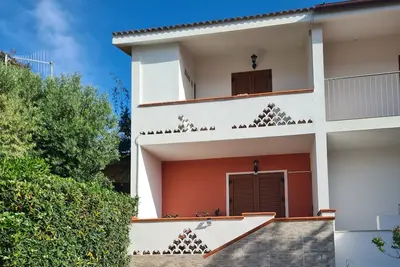 Image de San Teodoro, proche de la plage avec double salle de bains.