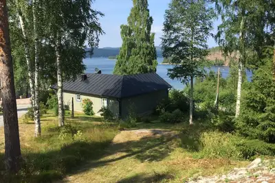 Image de maison de vacances idyllique en bord de mer<br>
