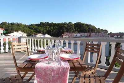 Image de Appartement de deux chambres avec la terrasse Palit, Rab (A-14996-c)