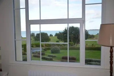 Image de Appartement Duplex à proximité de la plage et du golf. Wifi gratuit.