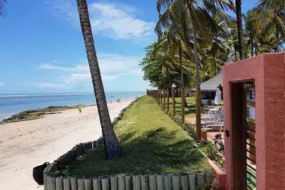 Image de Accueil sur Coral Beach Appartement (pied dans le sable).