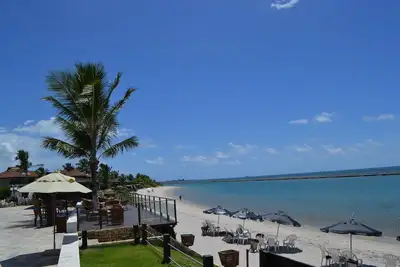 Image de Appartement au rez-de-chaussée avec balcon dans Marupiara Suites Appartement 120 - 12x chambres