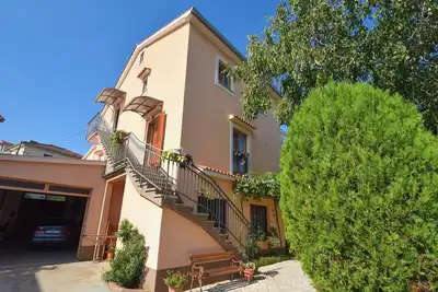 Image de Appartement de vacances avec air conditionné et barbecue