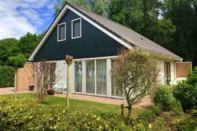 Image de Maison de vacances à Drenthe avec beaucoup de luxe o. A. Sauna extérieur, 8 pers. ensemble de salon, barbecue