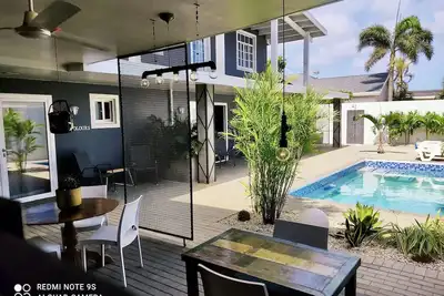 Image de Beau studio avec piscine, très proche de Eagle Beach