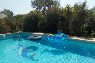 Image de Villa Ruscana et sa piscine à 500m du Golfe de Pinarello