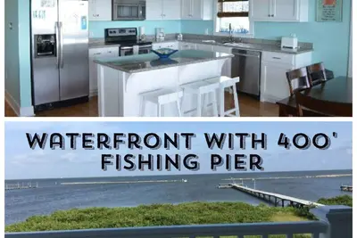 Image de Waterfront Home w / 400 'Fishing Pier. Crabe et poisson au large de la jetée avec accès en bateau.
