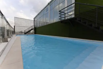 Image de Bel appartement avec piscine et salle de gym