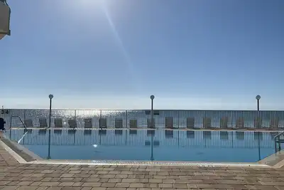 Image de Ke arriver n'importe quel jour, piscine sur la plage, cuisine complète, W / D, parking, quais, balcon,
