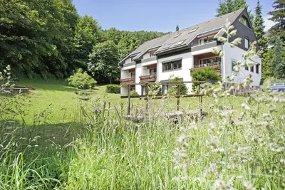 Image de Appartement lumineux pour 6 personnes au rez-de-chaussée avec une terrasse dans le jardin juste à côté de la forêt