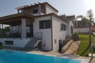 Image de Maison jumelée avec piscine privée dans le plus bel emplacement de Budoni