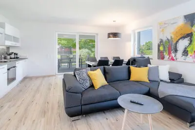 Image de Cottage avec grande terrasse couverte sur le lac Klopein