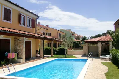 Image de Oliva est idéal pour des vacances en famille, pour se détendre au bord de la piscine ou des plages