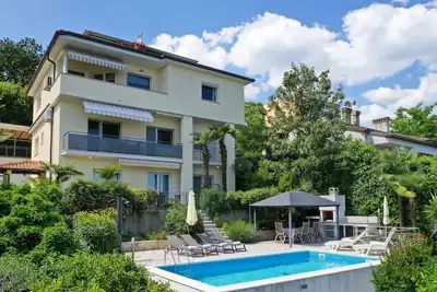 Image de Appartement de deux chambres avec la terrasse et la vue sur le mer Opatija (A-7916-a)