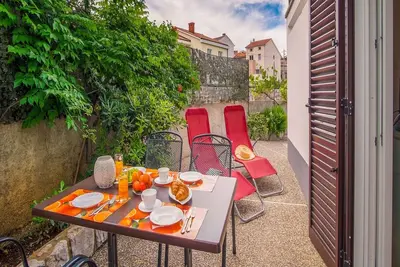 Appartement de vacances avec une belle terrasse, proche de la plage