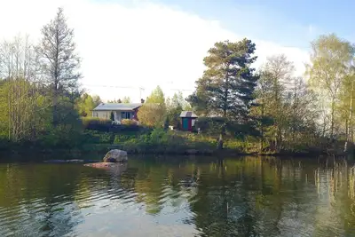 Image de Charmante maison avec confort dans un emplacement fantastique au bord du lac
