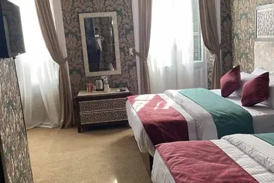 Image de Chambre Quadruple PRIVÉE. Vue Sur La Ville
